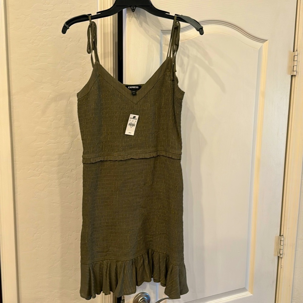 Express brand dark green dress with specs of gold.